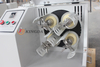 A laboratory planetary ball mill is used to grind powders and balls